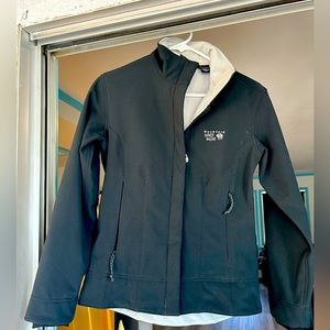 Women’s mountain hardware waterproof, hard shell jacket.